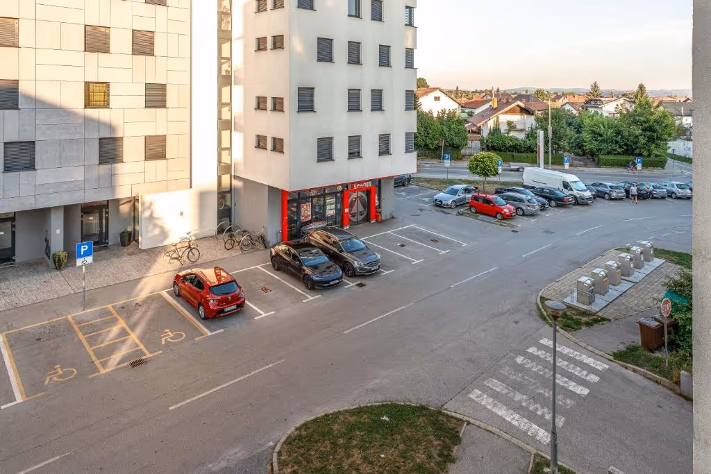 Baroque street in Varaždin's old town with ornate facades and a cobblestone square.